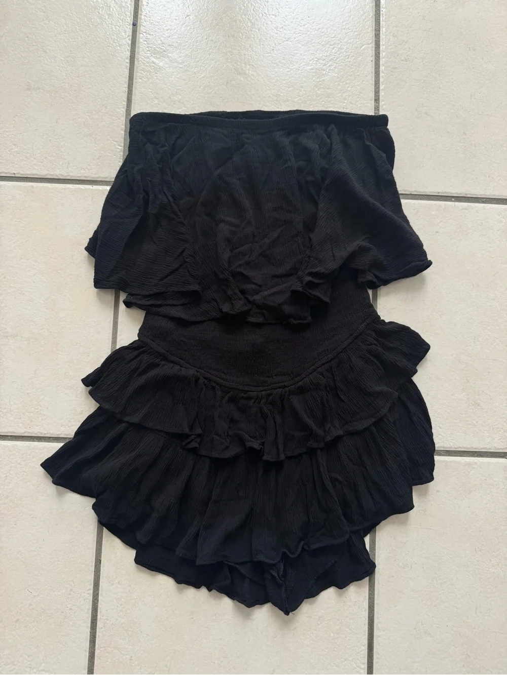 Black ruffle romper